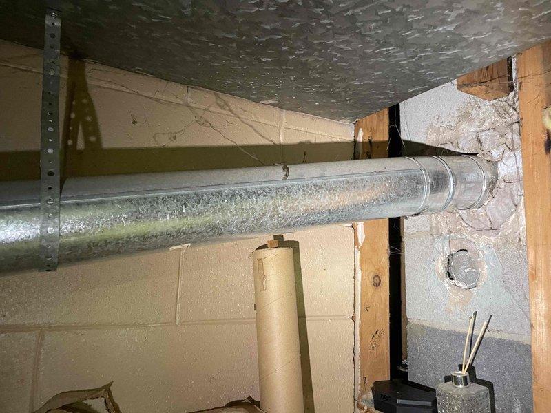 Provided comprehensive estimate for furnace and hot water tank replacement in basement location. Existing equipment operational but aged beyond recommended service life. Documented current installation including water heater dimensions and HVAC ductwork configuration. Assessed mechanical room conditions, noting insulated supply duct with condensation present and concrete block foundation walls suitable for new equipment installation.