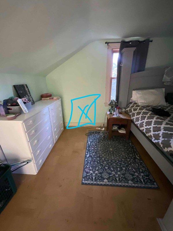 Responded to service call for no air conditioning in upstairs master bedroom. Performed inspection of attic bedroom space and identified disconnected HVAC supply line preventing conditioned air from reaching the room. Documented existing conditions and room layout for estimate preparation. Provided customer with two comprehensive estimates: first option for reconnecting the upstairs ductwork as part of a complete central air conditioning system installation for the entire home, and second option for installing a ductless mini-split system to serve the affected bedroom independently.