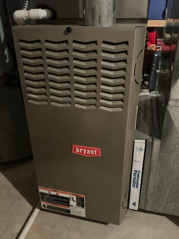 Completed annual heating maintenance on Bryant furnace system. Performed comprehensive inspection of all components including blower motor, electrical connections, capacitor, and control systems. Verified proper operation of safety controls, checked ductwork connections, inspected condensate drain lines and PVC venting, and confirmed all manufacturer specifications were met. System tested and operating within normal parameters.
