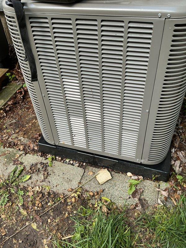 Performed annual cooling maintenance on residential air conditioning system. Inspected outdoor condenser unit, verified proper operation of compressor and condenser fan motor, checked refrigerant lines and connections for leaks, cleaned debris from around unit base, and confirmed system functionality. Unit operating within normal parameters with no issues identified.