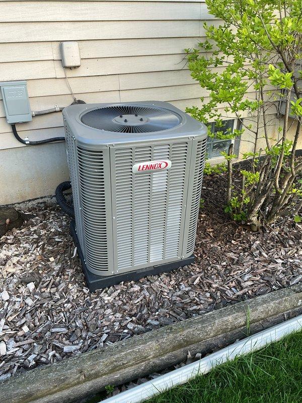 Completed preventative maintenance tune-up on residential Lennox condensing unit. Replaced air filter and inspected equipment pad condition, ensuring proper installation in mulched landscape area with adequate clearance from surrounding vegetation and structure. All components operating within normal parameters upon completion of service.