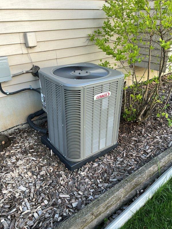 Completed preventative maintenance tune-up on residential Lennox condensing unit. Replaced air filter and inspected equipment pad condition, ensuring proper installation in mulched landscape area with adequate clearance from surrounding vegetation and structure. All components operating within normal parameters upon completion of service.