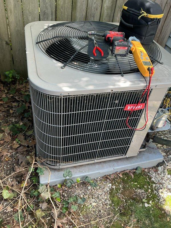 Completed annual cooling maintenance on Bryant condenser unit. Performed comprehensive system diagnostics using digital multimeter to verify electrical readings at 902 specification. Tested capacitor microfarad values, voltage levels, and amperage draws to ensure proper compressor and fan motor operation. Inspected condenser coils, refrigerant pressures, and overall unit performance to confirm system operating within manufacturer specifications for optimal cooling season readiness.