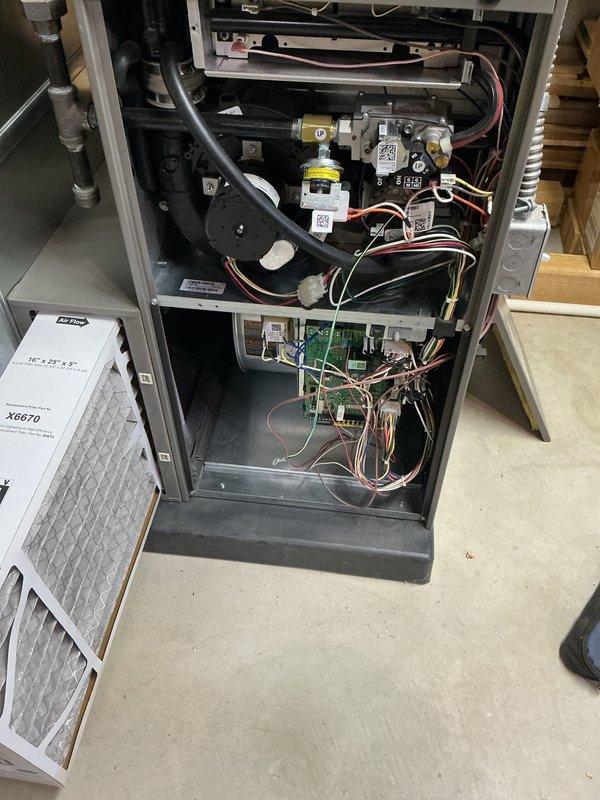 Completed comprehensive ComfortGuard maintenance visit on residential furnace system. Performed full system inspection including heat exchanger, draft inducer motor, gas valve assembly, control board, and all electrical connections. Replaced air filter with new 16x25 pleated filter per maintenance protocol, ensuring proper airflow and system efficiency for continued reliable operation.