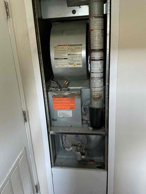 Responded to no heat call on forced air furnace system. Upon arrival, found furnace tripping circuit breaker and unable to maintain operation. Inspection revealed severely clogged air filter with heavy dust and debris accumulation, restricting airflow and causing system to overheat and trip safety controls. Replaced dirty pleated filter with new filter. Cleared tripped breaker and restarted system. Verified proper airflow through supply vents, confirmed ignition sequence, and monitored furnace through complete heating cycle. System now operating normally with adequate heat distribution throughout home. Advised homeowner on importance of regular filter maintenance every 1-3 months to prevent future overheating issues and system shutdowns.