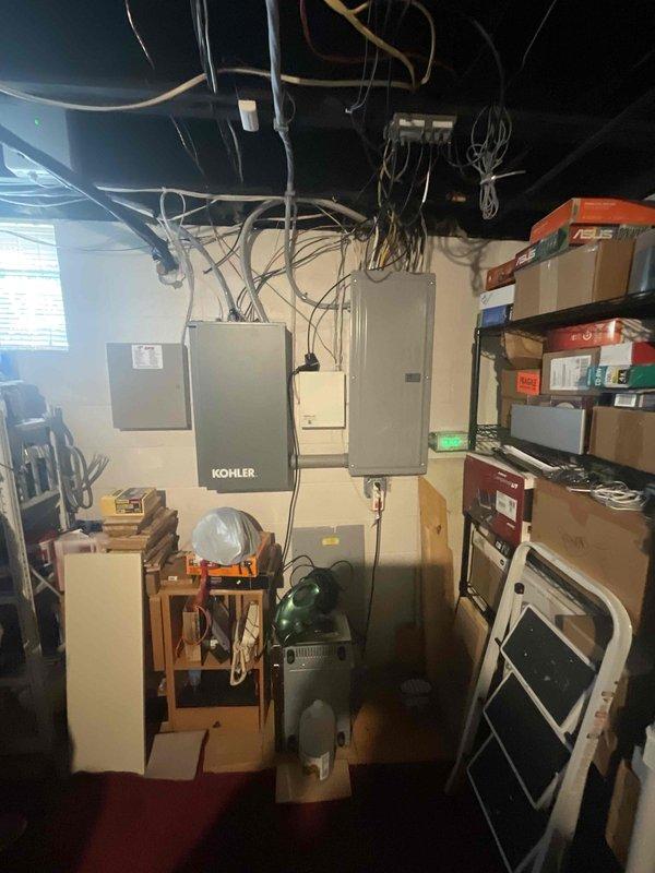 Completed electrical estimate for replacement of existing whole home generator system. Evaluated current Kohler generator unit installed on concrete paver pad in backyard with proper clearances and ventilation. Assessed electrical infrastructure including Kohler transfer switch and associated wiring in basement utility area to ensure compatibility with replacement unit specifications.