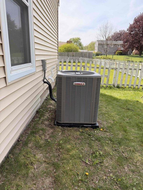 Completed full HVAC system installation including a Lennox 90,000 BTU high-efficiency furnace and 3-ton air conditioning unit with right-side configuration. Installed humidifier, ran refrigerant lines and electrical conduit along exterior siding to outdoor condenser unit positioned on concrete pad. Connected all ductwork including metallic transitions and elbow joints in basement mechanical room, verified proper airflow distribution, and reconnected all existing systems. Outdoor condenser professionally positioned with appropriate clearances from structure, all refrigerant lines insulated and secured. System startup completed with full operational testing of heating and cooling cycles, airflow verification, and thermostat calibration. All work performed to code with mechanical permits obtained prior to installation.