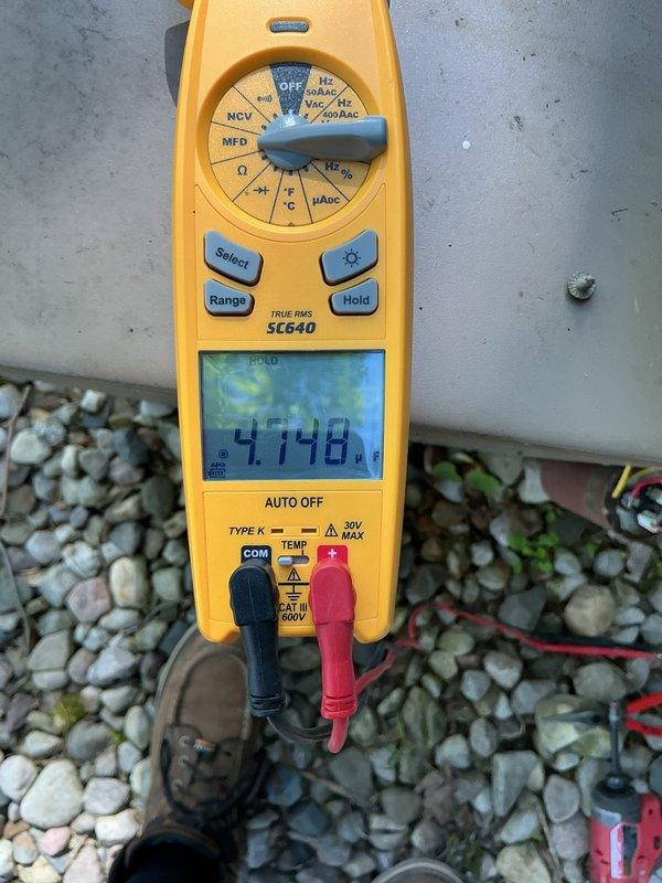 Performed scheduled air handler maintenance on outdoor condensing unit. Conducted comprehensive electrical diagnostics using digital multimeter, measuring voltage and system parameters to verify proper operation. Unit tested at 4748 readings during electrical assessment. Inspected condenser coils, fan assembly, and all electrical connections for proper function and safety compliance. All systems operating within normal specifications upon completion of maintenance service.