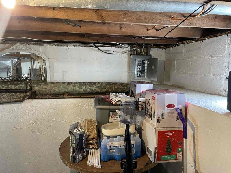 Provided estimate for air conditioning system replacement in basement location where no current A/C unit exists. Assessed installation site featuring existing furnace with PVC venting, concrete block walls, and available space for new equipment placement. Evaluated electrical infrastructure including panel box and wiring capacity, reviewed ductwork configuration with existing metallic supply ducts, and confirmed basement access and clearances for proper equipment installation and future service requirements.