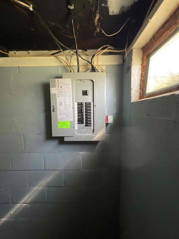 Conducted comprehensive site assessment for HVAC system replacement estimate on 30+ year old natural gas furnace located in basement and outdoor air conditioning condenser unit. Evaluated existing equipment condition, electrical panel capacity, installation accessibility, and documented current system configuration including outdoor AC unit positioned on concrete pad with adequate clearance and basement-mounted furnace with accessible gas supply. Provided replacement recommendations for complete heating and cooling system upgrade to improve efficiency and reliability.