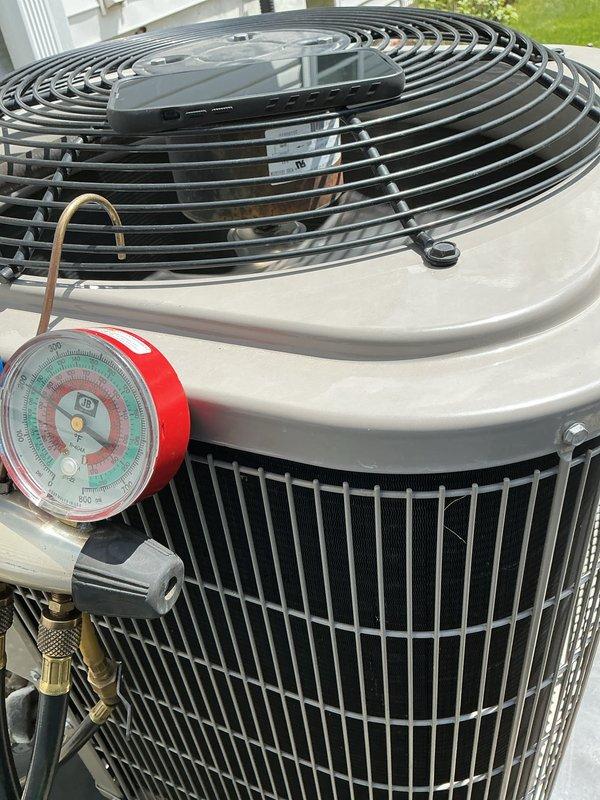 Completed comprehensive air conditioning tune-up on residential system. Performed inspection of indoor blower motor assembly, verified proper operation and documented equipment serial numbers. Conducted outdoor condenser unit evaluation, checked refrigerant pressures using manifold gauges, and confirmed system operating within manufacturer specifications.