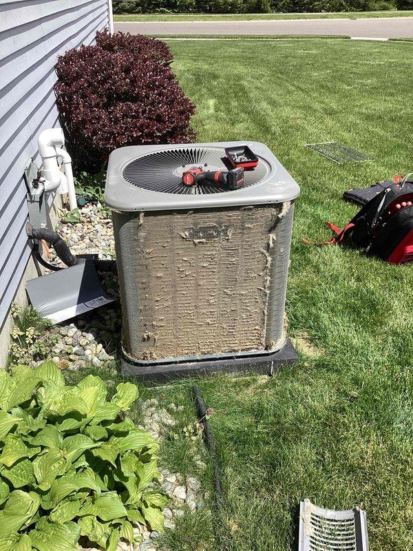 Completed annual cooling maintenance on residential air conditioning system. Performed comprehensive inspection of outdoor condenser unit, including cleaning of coil surfaces, verification of refrigerant charge, and filter evaluation. Unit found in operational condition with normal wear appropriate for age, all components functioning within manufacturer specifications.