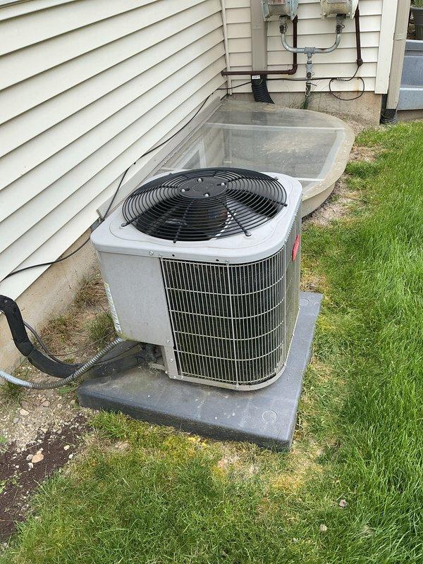 Completed comprehensive air conditioning tune-up on residential outdoor condenser unit. Performed standard seasonal maintenance including inspection of condenser coils, fan motor operation, refrigerant line connections, and electrical components. Unit tested and confirmed operating within normal parameters with all systems functioning properly.