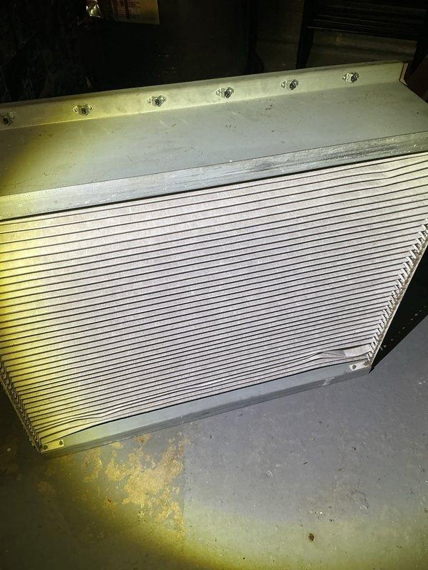 Completed annual cooling maintenance on HVAC system. Inspected evaporator coil and condenser units, noting significant debris accumulation and soiling on outdoor condenser coils requiring attention. Replaced air filter and documented equipment condition with photographs for maintenance records.