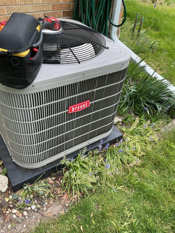 Completed annual cooling maintenance on Bryant outdoor condensing unit. Performed comprehensive system diagnostics including electrical testing with digital multimeter, recording temperature differential and electrical readings to verify proper system operation. Inspected condenser coil, fan assembly, and all exterior components. Unit operating within normal parameters with all measurements documented for service records.