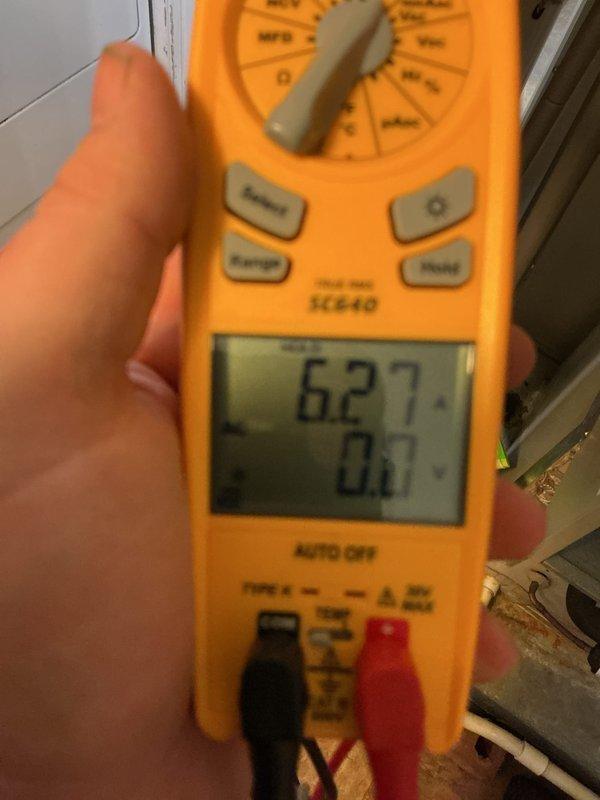 Completed annual cooling maintenance on HVAC system. Performed comprehensive system diagnostics using digital multimeter, recording voltage readings of 627V at indoor unit and amperage draw of 0.53A at outdoor condenser unit. All electrical measurements fall within manufacturer specifications, indicating proper system operation and component functionality.