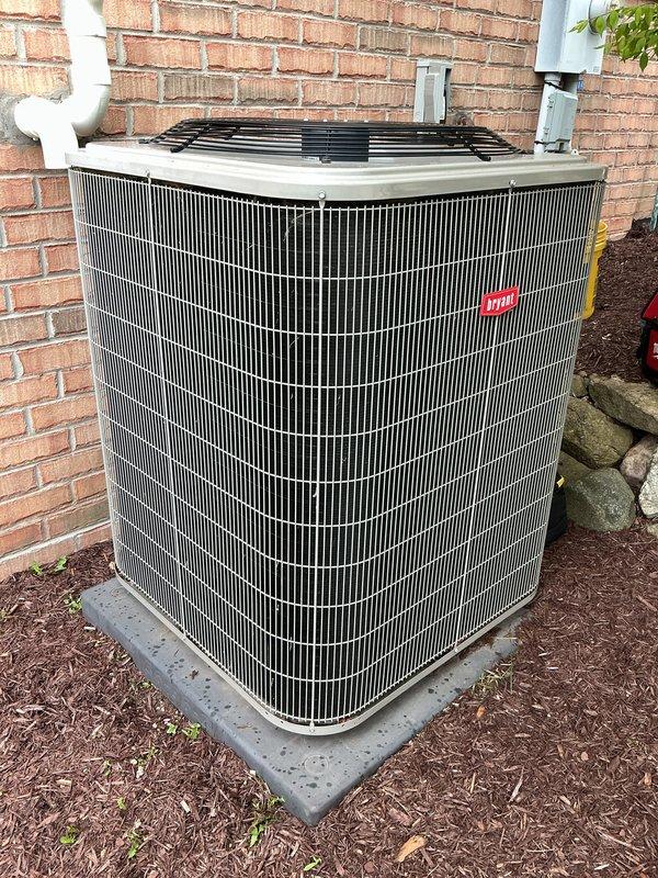 Completed comprehensive annual maintenance on 26-year-old residential air conditioning system. Performed full system inspection including refrigerant levels, electrical connections, condenser coil cleaning, and operational testing of all components. Unit is functioning properly with no deficiencies noted; system demonstrates good performance despite age, with exterior condensing unit well-maintained and properly positioned on concrete pad with adequate clearance for airflow and service access.