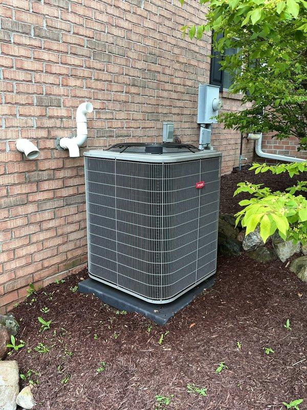 Completed comprehensive annual maintenance on 26-year-old residential air conditioning system. Performed full system inspection including refrigerant levels, electrical connections, condenser coil cleaning, and operational testing of all components. Unit is functioning properly with no deficiencies noted; system demonstrates good performance despite age, with exterior condensing unit well-maintained and properly positioned on concrete pad with adequate clearance for airflow and service access.