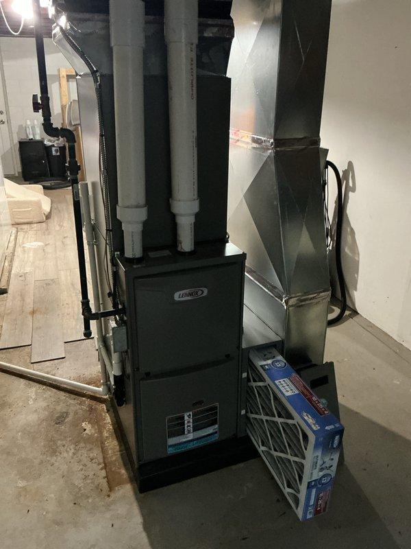 Completed annual cooling maintenance on Lennox HVAC system. Accessed air handler unit, inspected serpentine evaporator coil assembly showing clean condition with proper fin spacing and no visible debris accumulation. Verified refrigerant line connections at brass fittings, checked condensate drain system including PVC piping for proper operation, and examined all electrical connections and wiring harnesses. Replaced air filter with new unit. All components operating within normal parameters with no issues identified.