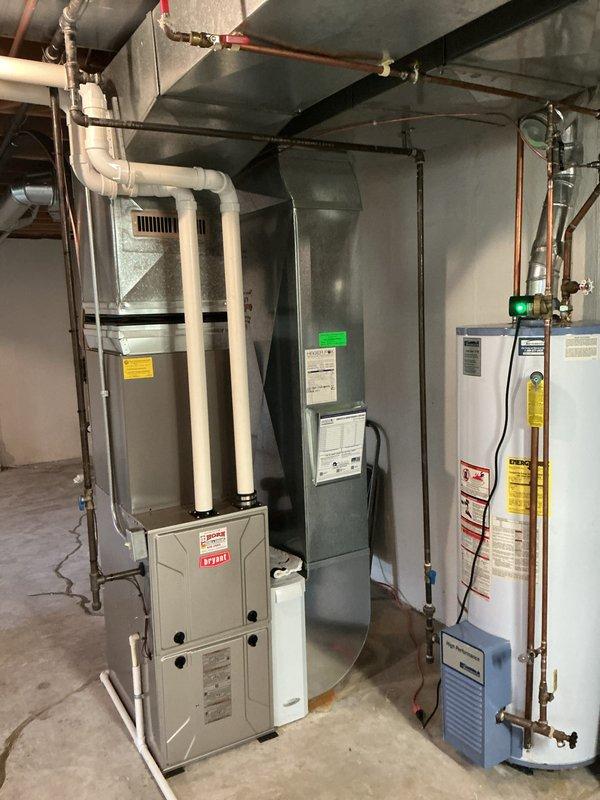 Completed annual cooling maintenance on residential HVAC system, including inspection of furnace, ductwork, and air filtration components. Assessed 20-year-old water heater per customer request and documented equipment condition with photographs for quote preparation.