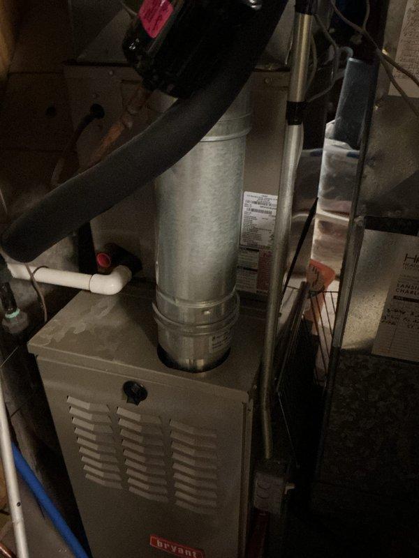 Completed annual cooling maintenance on residential Bryant HVAC system. Performed comprehensive inspection of furnace unit, humidifier assembly, blower motor, and associated ductwork and drainage components. All equipment photographed and documented as operating within normal parameters.