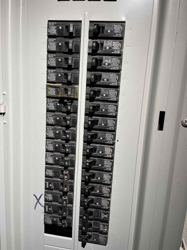 Conducted site evaluation for new standby generator installation at 20-year-old owner-occupied residence with no existing backup power system. Assessed existing electrical panel configuration, documented current breaker layout and available capacity, and evaluated gas appliance infrastructure including range connection for fuel source compatibility. Photographed electrical service equipment and utility connections to develop comprehensive quote for whole-home generator system with automatic transfer switch integration.