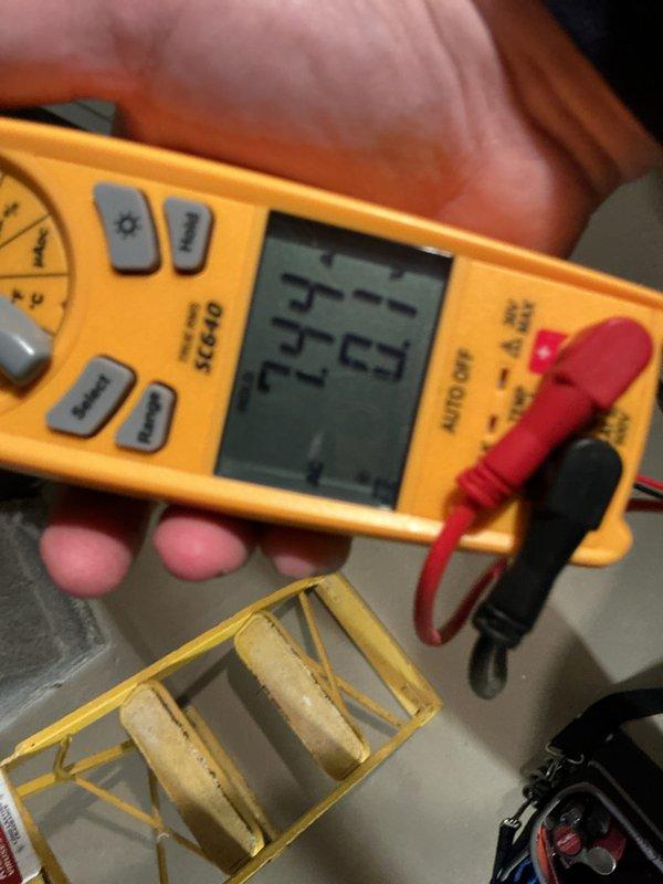 Completed comprehensive AC tune-up on new system with no reported issues. Performed standard maintenance including air filter replacement with new pleated media filter, verified proper system operation, and tested electrical voltage readings which measured 24.53 volts, confirming correct low-voltage control circuit operation.