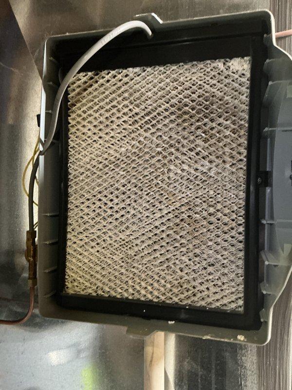 Completed scheduled air conditioning maintenance service. Inspected evaporator coil and replaced dirty air filter with new USA-made pleated filter to restore proper airflow and system efficiency. Evaluated evaporator pad condition per maintenance protocol.