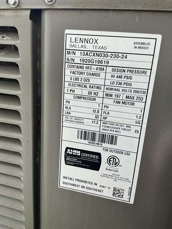 Completed annual cooling maintenance on Lennox model 13ACXN030-230-24 air conditioning system. Performed comprehensive tune-up including inspection of outdoor condenser unit, verified refrigerant charge of HFC-410A at factory specification of 5 lbs 2 oz, checked electrical connections and components, inspected compressor operation, and confirmed all system parameters within manufacturer specifications. Unit operating normally with no issues found. Documented equipment specifications and current condition with photos for service records.