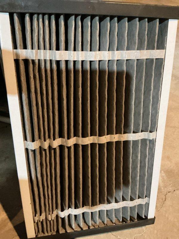 Completed annual cooling maintenance inspection on residential HVAC system. Inspected basement mechanical room equipment including air handler and ductwork for proper operation and physical condition. Evaluated and documented existing air filter showing moderate dust accumulation with discoloration throughout pleated media, indicating normal service cycle usage. All accessible components including ductwork, connections, and mechanical equipment were visually inspected and found to be in satisfactory operating condition.