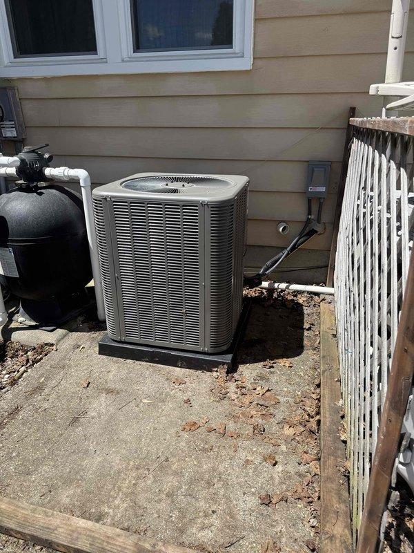 Successfully completed installation of a 3-ton air conditioning system with evaporator coil at residential property. Unit was positioned on concrete pad at rear exterior location with proper clearances maintained. Refrigerant lines were routed along exterior siding and connected to outdoor condenser unit. Electrical disconnect box was mounted and wired per code requirements. All mechanical connections were completed, system was pressure tested, evacuated, and charged to manufacturer specifications. Unit was tested for proper operation and airflow verified. Installation was performed in accordance with local mechanical and electrical permit requirements.