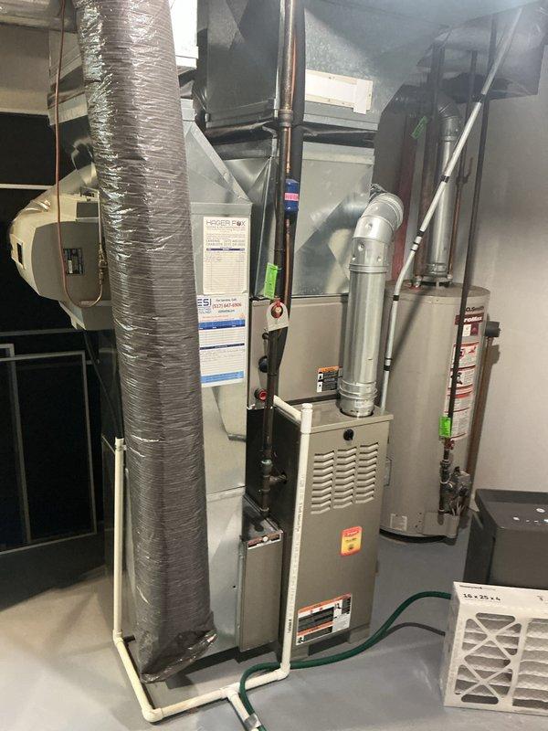 Completed scheduled air conditioning maintenance on residential HVAC system. Performed comprehensive inspection of furnace/air handler unit, verified proper operation of all components, checked refrigerant lines and insulation integrity, inspected condensate drain system and PVC drainage lines for proper flow, examined ductwork connections and seals, and confirmed all safety labels and system documentation were present and legible. System operating within normal parameters with no issues identified.