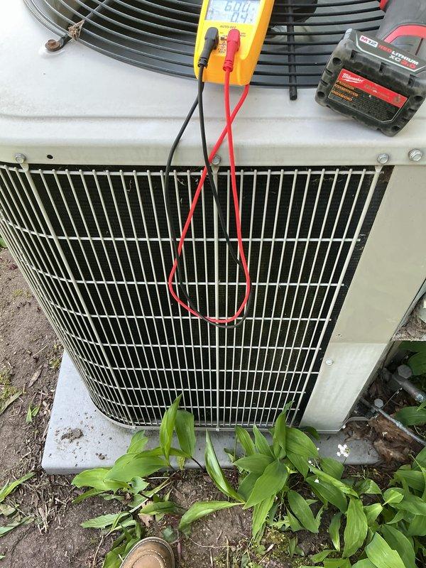 Performed comprehensive air conditioning tune-up on outdoor condensing unit, including electrical diagnostics with digital multimeter to verify system voltage and amperage readings. All measurements were within manufacturer specifications, condenser coils inspected, and unit confirmed operational for the cooling season.