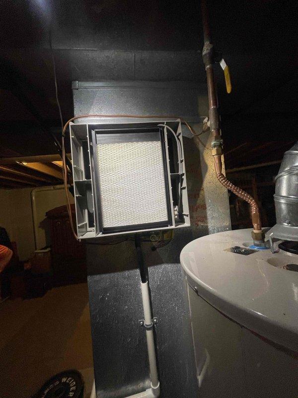 Conducted on-site assessment for whole-home humidifier installation in a 2,300 square foot two-story colonial residence. Evaluated existing HVAC system in basement utility area, including ductwork configuration, current air filtration setup, and available connection points for humidifier integration with copper water supply lines. Documented equipment layout and provided comprehensive estimate for humidifier installation compatible with existing forced-air heating system.