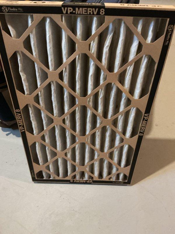 Completed annual cooling maintenance inspection on HVAC system. Evaluated and documented condition of existing Flanders VP-MERV 8 air filter showing dust accumulation and discoloration, indicating normal usage. Inspected humidifier assembly including evaporator pad with honeycomb media and associated water supply connections, confirming proper installation and operation of all system components.