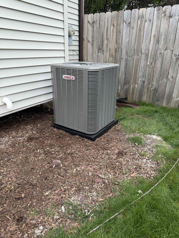 Completed full installation of 3-ton Lennox air conditioning condenser unit and evaporator coil system in residential property. Outdoor condenser positioned on pad in backyard with proper clearance for airflow, connected to indoor evaporator coil mounted on existing furnace in basement utility area. Installed refrigerant line set connecting outdoor and indoor components, completed all electrical connections for right-side configuration, and reconnected system per mechanical permit specifications. System tested and verified operational upon completion.