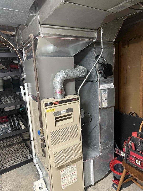 Completed installation of a 2-ton Lennox air conditioning system with matching evaporator coil. Installed outdoor condenser unit on concrete pad in rear yard location and connected new indoor coil to existing furnace system. Ran new dedicated electrical circuit to support the AC system and completed all required mechanical and electrical permit work for the installation.