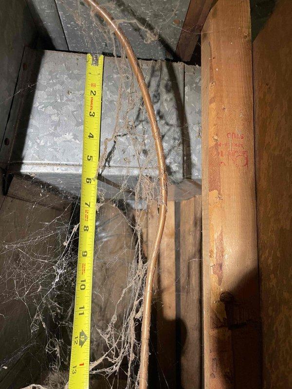 Conducted comprehensive site evaluation for full HVAC system replacement at residential property. Existing equipment consists of a 16-year-old furnace and 4-year-old air conditioning unit, with customer requesting replacement of aging furnace and installation of new AC system. Performed detailed assessment of attic-installed equipment, documenting existing ductwork dimensions and clearances using precision measurements. Evaluated structural accessibility, existing copper refrigerant line conditions, and duct system configuration to determine optimal replacement specifications. Photographed current installation conditions including ductwork layout, insulation placement, and spatial constraints within attic cavity. Assessment revealed adequate access for equipment removal and new system installation. Provided customer with complete system replacement quote addressing both heating and cooling components to meet requested timeline for replacement within current season.