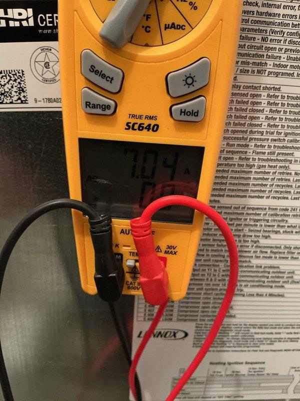 Performed annual cooling maintenance on York outdoor condensing unit. Conducted comprehensive system inspection including electrical measurements with clamp meter, verified proper compressor and fan motor operation, and completed routine maintenance checklist. Unit found operating within manufacturer specifications with all components functioning properly.