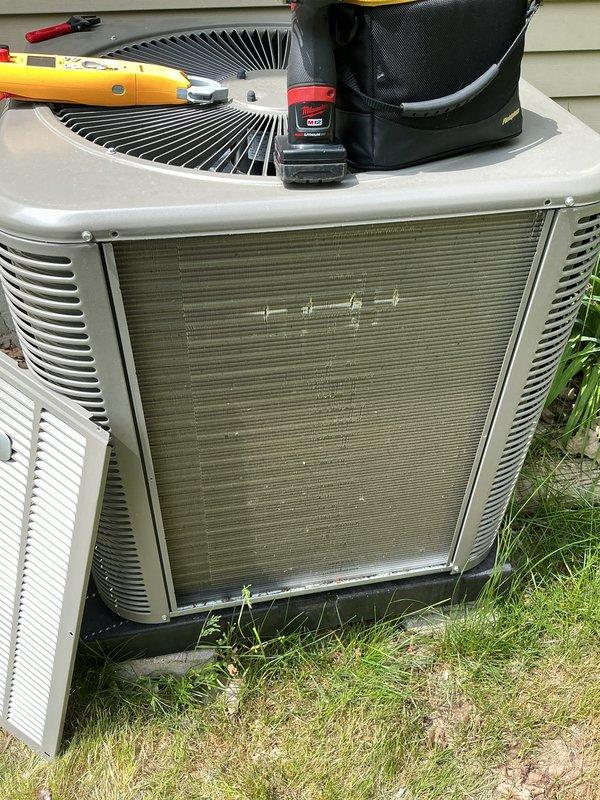 Performed annual cooling maintenance on York outdoor condensing unit. Conducted comprehensive system inspection including electrical measurements with clamp meter, verified proper compressor and fan motor operation, and completed routine maintenance checklist. Unit found operating within manufacturer specifications with all components functioning properly.