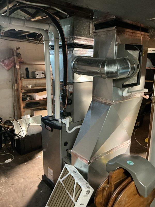 Completed annual HVAC maintenance inspection on residential forced-air heating system with air handler configuration. Replaced heavily contaminated pleated air filter that showed significant dust and debris accumulation, which was restricting airflow and reducing system efficiency. Inspected furnace cabinet, ductwork connections, gas line, condensate drain system, and PVC venting components, confirming all equipment is operating within normal parameters.