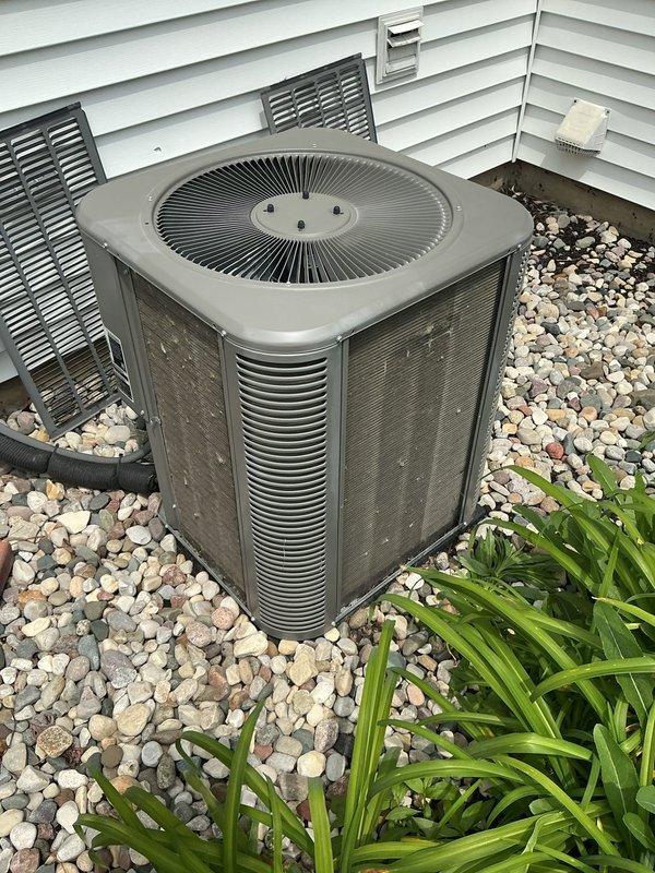 Completed ComfortGuard Maintenance Package on residential HVAC system. Performed comprehensive inspection of outdoor condenser unit, replaced air filters and humidifier pads as requested, and verified proper system operation. Unit showed normal weathering for outdoor installation with adequate clearance and drainage around equipment.