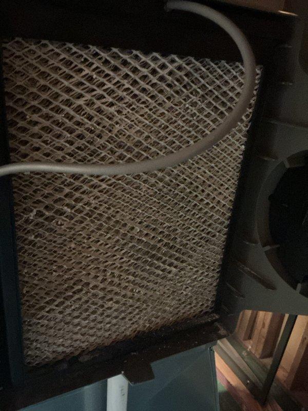 Completed annual HVAC maintenance on residential air handler and furnace system, including heating and cooling components. Performed comprehensive inspection of furnace interior, control board, electrical connections, and wiring harnesses, confirming all components operational. Inspected evaporator coil and noted filter requiring replacement due to significant dust and debris accumulation; replaced filter to restore proper airflow and system efficiency.