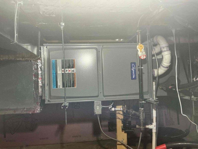 Responded to no cooling call with thermostat displaying blinking "cool on" message and indoor blower failing to operate. Upon arrival, verified heat mode functioned properly while cooling mode failed to engage blower motor. Inspected outdoor condensing unit and indoor air handler in attic space. Diagnosed failed blower motor relay or control board issue preventing 24-volt call signal from energizing indoor fan during cooling cycle. Traced electrical connections from thermostat through furnace control board and confirmed lack of power delivery to blower motor during cooling demand. Recommended control board replacement or relay repair to restore cooling function, as outdoor unit ready to operate but indoor air circulation component not responding to thermostat commands.