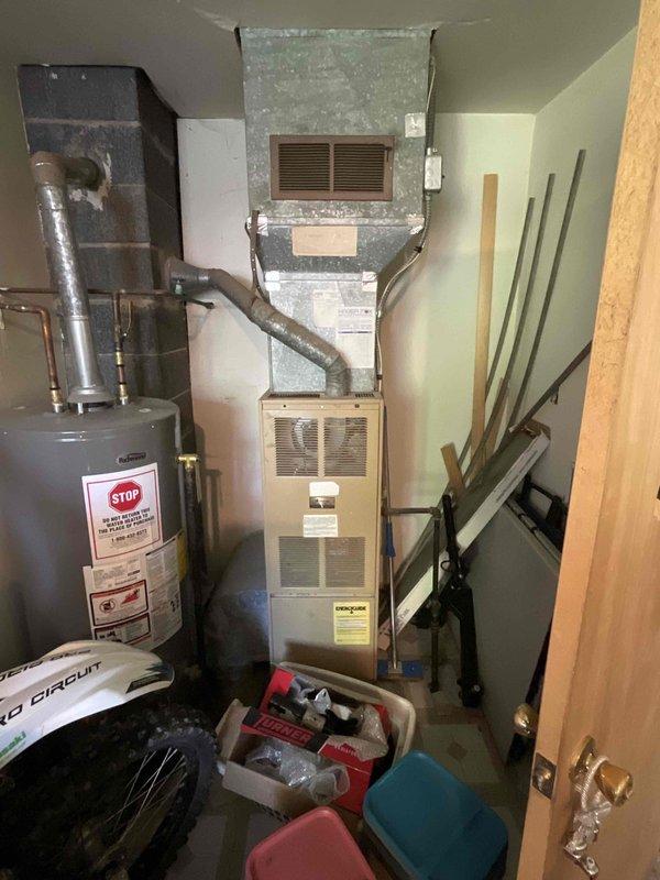 Conducted on-site assessment for new air conditioning system installation in residential property with no existing cooling infrastructure. Evaluated existing Amana furnace and mechanical room configuration to determine optimal AC installation approach. Provided comprehensive quote comparing central air conditioning system versus ductless mini-split options, reviewing equipment placement, electrical requirements, and integration with current HVAC setup to meet requested timeline for completion.