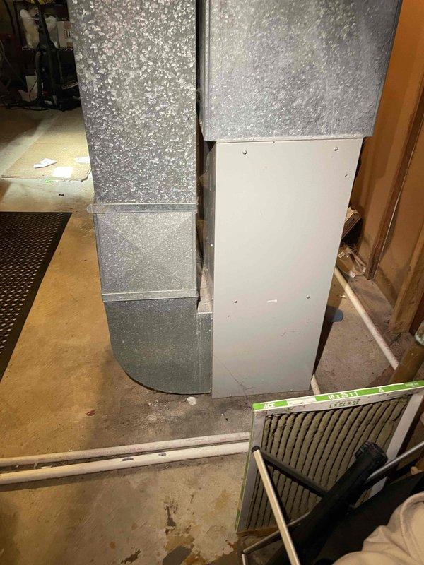 Conducted comprehensive evaluation of central air conditioning system experiencing insufficient cooling capacity. Assessed existing HVAC equipment including furnace, air handler, ductwork, filtration system, and electrical disconnects to determine system performance issues. Documented current system condition with detailed photos of mechanical room components, air filter housing with accumulated debris, galvanized ductwork configuration, and outdoor disconnect panel. Prepared full system replacement estimate for new furnace and air conditioning equipment to address cooling deficiency and restore proper climate control functionality.