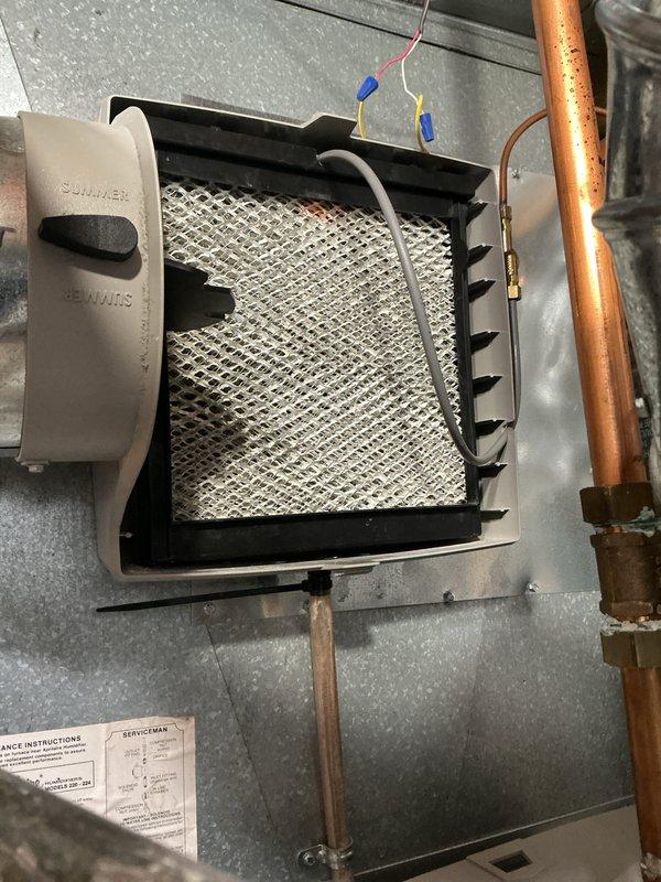Completed annual cooling maintenance on HVAC system. Performed comprehensive inspection of air handling unit, verified proper operation of all components, checked filter assembly and mesh screen condition, inspected electrical connections and wiring, examined copper refrigerant lines and brass fittings for leaks or damage, and confirmed all safety labels and manufacturer specifications were visible and intact. System found to be operating within normal parameters with City of Lansing Building Safety Office approval current and documented.