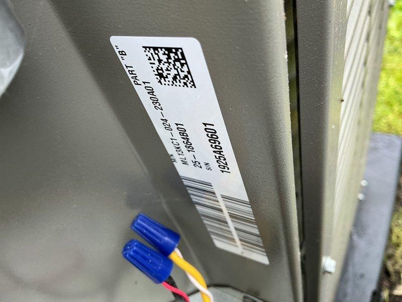 Performed ACM5 preventive maintenance on outdoor air conditioning unit. Connected manifold gauges to service ports and verified refrigerant pressures within manufacturer specifications. Documented equipment identification tag and electrical connections for service records.