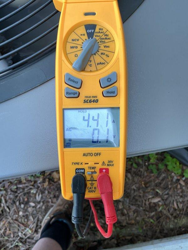 Completed annual cooling maintenance on residential outdoor condensing unit. Performed comprehensive system inspection, took electrical measurements showing 441V and verified proper amperage draw using digital multimeter. Unit operating within normal parameters, no repairs required at this time.