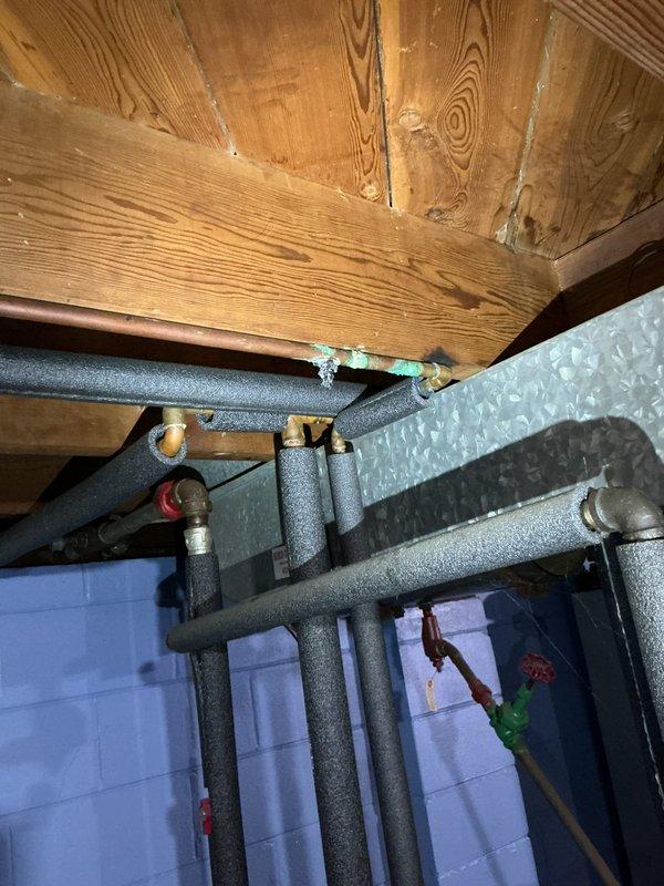 Responded to service call for non-operational basement air purifier unit over twenty years old. Performed comprehensive assessment of IAQ equipment and surrounding mechanical systems including evaluation of unit condition, electrical components, and operational viability. Documented existing installation with photos showing equipment location in basement mechanical room alongside HVAC infrastructure, plumbing connections, and ductwork. After thorough inspection, determined unit age and condition warranted replacement rather than repair. Provided customer with professional assessment findings and disposal recommendations for aged equipment.